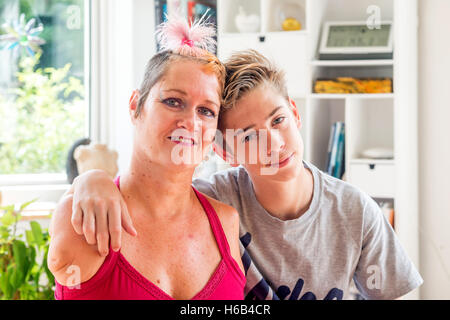 Artist Alison Lapper at home in Shoreham-by-Sea, with her son, Parys. Stock Photo