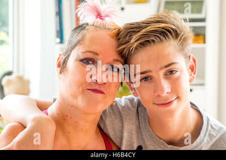 Artist Alison Lapper at home in Shoreham-by-Sea, with her son, Parys. Stock Photo