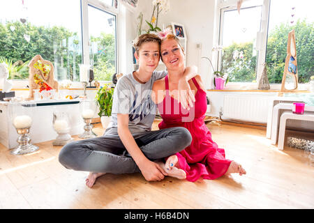 Artist Alison Lapper at home in Shoreham-by-Sea, with her son, Parys. Stock Photo