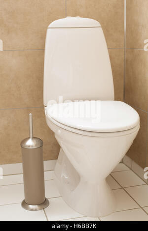white toilet bowl in modern bathroom