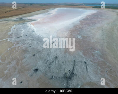 Top view of the salt lake mud sources. External similarity with craters. Mud healing springs. Stock Photo