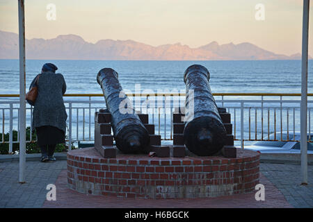 Old cannons from the Dutch and English colonial wars at the the Muizenberg, Surfers Corner, train station overlook the False Bay Stock Photo