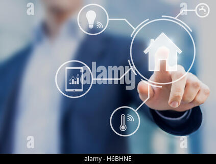 Smart home interface with button and icons providing control to temperature and lamps from mobile app Stock Photo