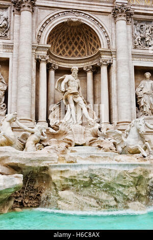 The Trevi fountain in Rome, the largest Baroque fountain in the city. Stock Photo