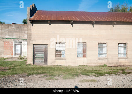 Boarded up windows on a derelict rural building in Celina Texas. Stock Photo