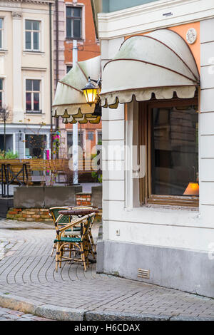 A small cozy café on the corner of the street. Riga. Latvia Stock Photo