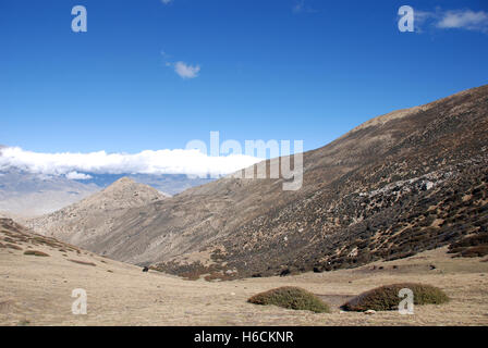 The Barren mountain landscape of the remote Damodar Himal in the Mustang region of Nepal an area first visited by Bill Tilman Stock Photo