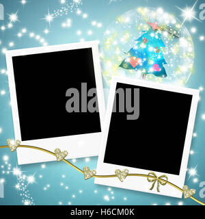 Christmas cards photo frames, two instant photo frames and christmas tree within a ball  on blue  paper background Stock Photo