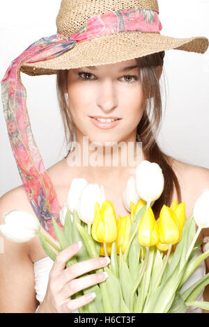 Young woman with flower arrangement as a headdress Stock Photo - Alamy