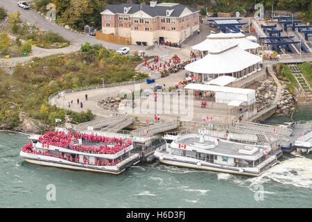 A Hornblower Niagara Cruises tour boat prepares to depart for Horseshoe Falls in Niagara Falls, Ontario, Canada. Stock Photo