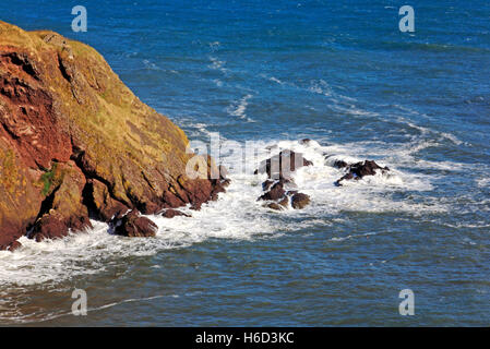 A view of a rocky headland at Dunnottar Castle, near Stonehaven, Aberdeenshire, Scotland, United Kingdom. Stock Photo