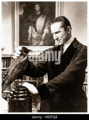 Dr. Richard Vollin, played by Bela Lugosi (1882-1956) and his mysterious visitor, from ‘The Raven’ (1935) directed by Lew Landers, a loose adaptation of the poem by Edgar Allan Poe (1809-1849). See description for more information. Stock Photo