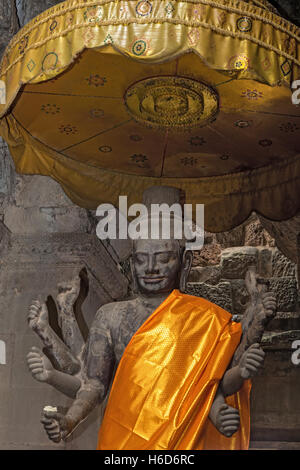 8 armed Buddha or Vishnu aka Ta Reach, Western entrance, Angkor Wat, Cambodia Stock Photo