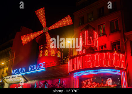 Moulin Rouge in Paris, France, at night Stock Photo