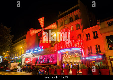 Moulin Rouge in Paris, France, at night Stock Photo