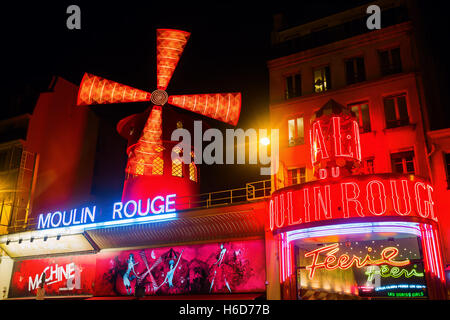 Moulin Rouge in Paris, France, at night Stock Photo