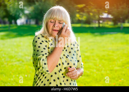 Old woman crying. Stock Photo