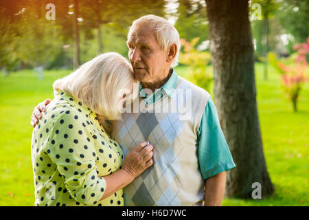 Woman leaning on man's shoulder. Stock Photo