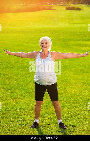 Senior woman doing exercise. Stock Photo