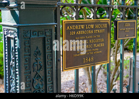 A bronze plaque on wrought iron fence at Andrew Low's 1848 House, home of Juliette Low, founder of the Girl Scouts, Savannah, GA Stock Photo