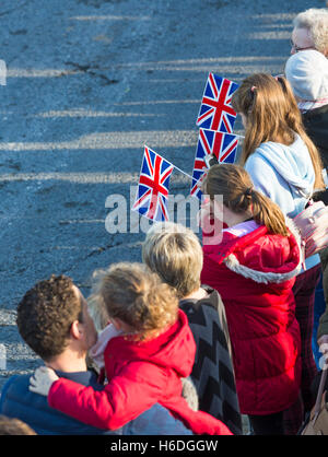 Dorchester, Dorset, UK. 27 October 2016. Royal supporters wait outside Dorchester South train station for the arrival of the Royal Party on the Royal train (Her Majesty the Queen accompanied by Prince Philip, Charles Prince of Wales and Camilla Duchess of Cornwall) before they go on to Poundbury Credit:  Carolyn Jenkins/Alamy Live News Stock Photo