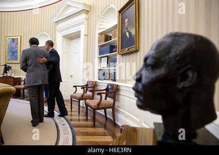 U.S. President Barack Obama meets with Martin Luther King, Jr. Research and Education Institute Scholar Writer in Residence Dr. Clarence B. Jones in the White House Oval Office February 2, 2015 in Washington, DC. Stock Photo