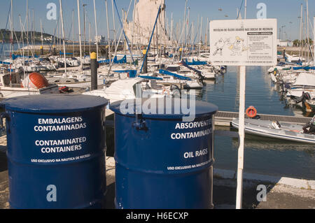 EUROPE, PORTUGAL, Lisbon (Lisboa), Belem, marina, recycling bins for  oily rags Stock Photo