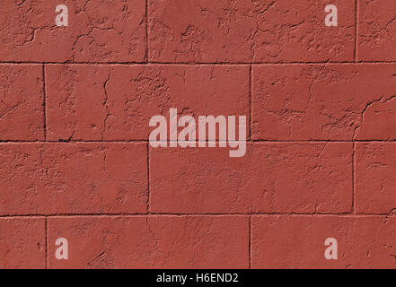 Red cinder block wall forms a pattern that can be used for backgrounds. Stock Photo