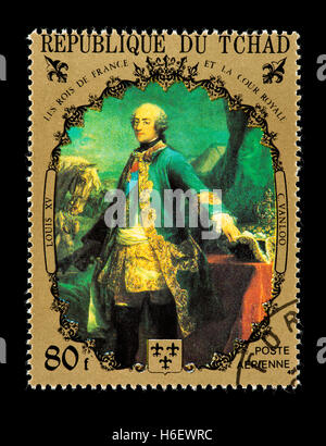 Postage stamp from Chad depicting the C. Vanloo painting of Louis XV. Stock Photo