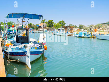 The fishing village of Liopetri with many old boats, moored on the river banks, Cyprus. Stock Photo