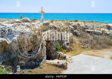 The old temple of Ayia Thekla, located in the small cave, next to the coast, Sotira, Cyprus. Stock Photo