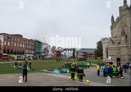 Firefighters damp-down a blaze which gutted the Castle Art Gallery, Cathedral Yard, Exeter, UK. Stock Photo