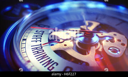 Staff Training - Wording on Pocket Watch. 3D Illustration. Stock Photo