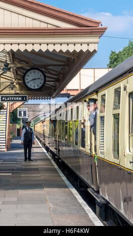 Station Master and Guard at Toddington railway station, Gloucestershire & Warickshire Steam Railway Stock Photo