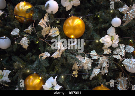 tastefully decorated Christmas tree with ribbons and balls Stock Photo