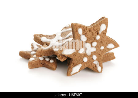 star shaped glazed cocoa christmas cookies isolated Stock Photo
