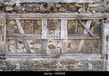 Detail of an ancient masonry with half-timbered Stock Photo