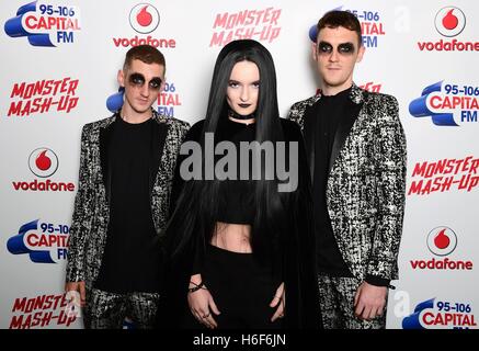 (left to right) Clean Bandit's Luke Patterson, Grace Chatto and Jack Patterson attending Capital's Monster Mash-Up with Vodafone at the Eventim Apollo in London. Stock Photo