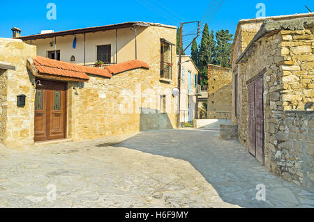 The stone street of old Kato Drys village, popular tourist location in mountain district of Cyprus, Larnaca Region. Stock Photo