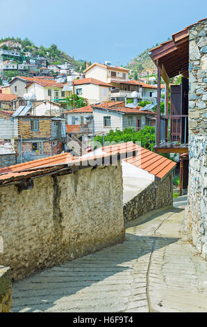 The narrow winding street of the hilly Pelendri village, located in Troodos, District, Cyprus. Stock Photo