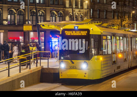 Metrolink tram at Exchange Square tramstopin Manchester. Stock Photo