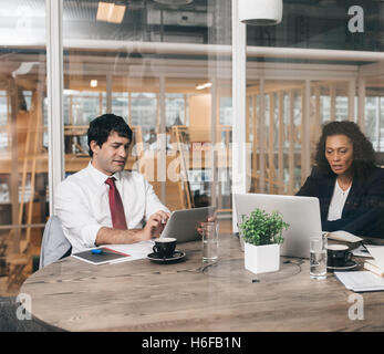 Focused on technology in the office Stock Photo