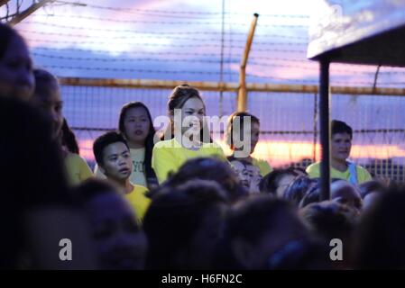 Malabon, Philippines. 26th Oct, 2016. A pretty inmate among the audience as they watch until the end of the beauty pageant. © George Buid/Pacific Press/Alamy Live News Stock Photo