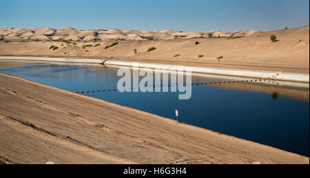 Araz Junction, California - The All American Canal runs through the Algodones Dunes, carrying water from the Colorado River. Stock Photo