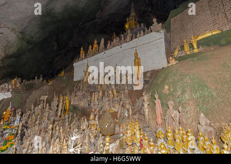 miniature Buddha sculptures, Tham Ting, lower cave,Pak Ou caves, Laos Stock Photo