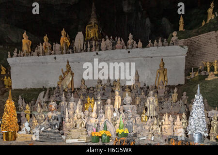 miniature Buddha sculptures, Tham Ting, lower cave,Pak Ou caves, Laos Stock Photo