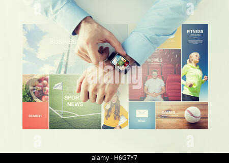 hands with news web pages on smart watch Stock Photo