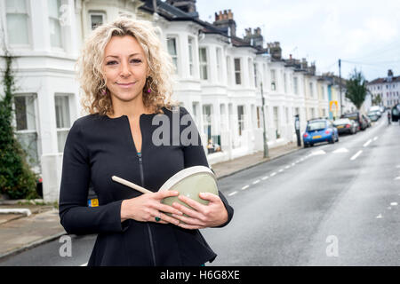 One-time Great British Bake-Off contestant Kate Henry at home in Brighton Stock Photo