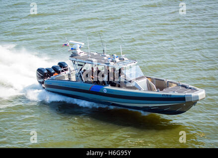 A Coastal Interceptor Vessel (CIV), a variant on SAFE 41 Center Console manufactured for the U.S. Customs and Border Protection's Air and Marine Operations (AMO) is put through its paces on the Potomac River, Washington DC. The 41-Foot Interceptor is primarily designed to intercept and chase the Go-fast boats favoured by smugglers. See description for more information. Stock Photo