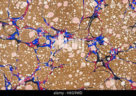 vintage brown red and blue marbled paper background Stock Photo